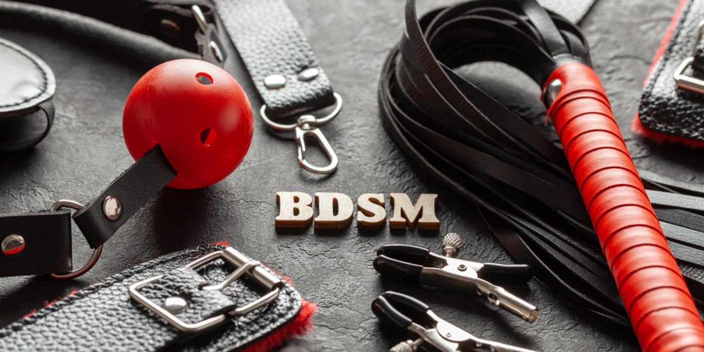 Femdom BDSM equipment with metal letter reading BDSM